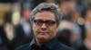 Film director Rasoulof fled Iran on foot, newspaper says