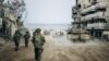Ibutho lakwele Israel lidinga iHamas ngamehlo abomvu eGaza. (Photo by Israeli Army / AFP) 