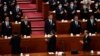 资料照片：习近平（中）出席2023年3月11号在北京召开的中国第十四届人大第一次会议。