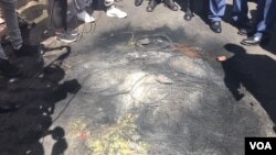 Indawo lapho okutshiselwe khona umuyi uElvis Nyathi odabuka eZimbabwe. (VOA)
