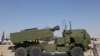 FILE - A US M142 HIMARS rocket launcher is parked on the tarmac at the 2021 Dubai Airshow in the Gulf emirate, Nov. 15, 2021. 