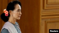 နိုင်ငံတော်အတိုင်ပင်ခံပုဂ္ဂိုလ် ဒေါ်အောင်ဆန်းစုကြည်။ (ယခင်မှတ်တမ်းဓာတ်ပုံ)