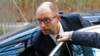 FILE - Ukraine's Prime Minister Arseniy Yatsenyuk arrives at a European leaders emergency summit on the situation in Ukraine, in Brussels.