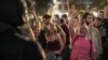 Demonstrators gather for a protest organized by social and civic groups, denouncing the handling of recent flooding under the slogan "Mazon, Resign," aimed at the president of the regional government Carlos Mazon, in Valencia, Spain, Nov. 9, 2024. 