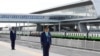 FILE - Kenya Railways attendants prepare to receive a train launched to operate on Standard Gauge Railway line constructed by the China Road and Bridge Corporation (CRBC) and financed by Chinese government as it arrives at the Nairobi Terminus, May 31, 2017.