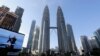 FILE - Roads are deserted during a lockdown due to the coronavirus outbreak, in Kuala Lumpur, Malaysia, June 1, 2021. 