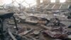 This photo provided by the anti-government activist group Aleppo Media Center, which has been authenticated based on its contents and other AP reporting, shows a damaged school that was hit by a Syrian government air strike in Aleppo, Syria, April 30, 201