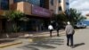 Patients walk into the Nairobi Hospital during a strike by government doctors to demand the fulfilment of a 2013 agreement between their union and the government that would raise their pay and improve working conditions, Feb. 15, 2017. 
