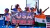 Fans of the United States cricket team cheer before an ICC Men's T20 World Cup cricket match between the United States and Ireland at the Central Broward Regional Park Stadium in Lauderhill, Fla., June 14, 2024. The match was abandoned due to rain. 