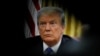 FILE - U.S. President Donald Trump looks on during a meeting with China's Vice Premier Liu He in the Oval Office at the White House in Washington, Feb. 22, 2019.