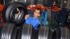 FILE - A worker removes a tire during production in a Goodyear factory in Bogor of Indonesia's West Java Province, Apr. 29, 2010.