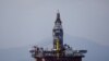 FILE - An oil platform operated by China National Offshore Oil Corporation (CNOOC) is seen in the sea off China's southernmost Hainan province, March 23, 2018.