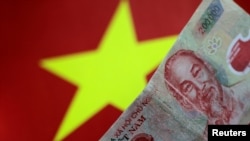FILE - A Vietnam Dong note is seen in this illustration photo May 31, 2017. 