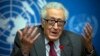 FILE - U.N. mediator for Syria Lakdar Brahimi gestures during a press briefing at the United Nations headquarters in Geneva, Switzerland, January 2014.