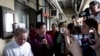 FILE - Rappler CEO Maria Ressa, second from left, talks to reporters after attending a hearing at Manila Regional Trial Court, Philippines, April 16, 2019.