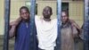 Omar Mwamnuadzi (C), leader of the separatist Mombasa Republican Council (MRC) arrives at the law court cells with members of the group at Kenya's Coastal region October 15, 2012. 