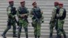 Kenyan paramilitary units take their positions during the Africa Union Peace and Security Council Summit on Terrorism, at the Kenyatta International Convention Centre, in Nairobi, Sept. 2, 2014.