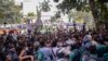 Policemen try to stop Bangladesh Nationalist Party activists marching near prime minister Sheikh Hassan's Awami League party office in Dhaka, Bangladesh, Nov. 10, 2024.