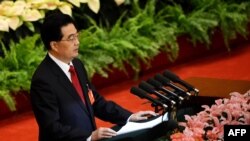 Chinese President Hu Jintao delivers his address at the opening of the 18th Communist Party Congress at the Great Hall of the People in Beijing, November 8, 2012.