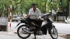 Một tài xế xe ôm 62 tuổi ở Hà Nội.