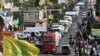Bendera Hezbollah berkibar menyambut kedatangan tanker yang membawa minyak Iran di al-Ain, Hermel, di Lembah Bekaa, Lebanon timur 16 September 2021. (AFP)