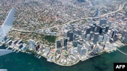 This aerial view shows downtown Miami on May 21, 2019. 