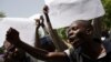 School teachers take part in a rally to call for the release of abducted schoolgirls held by Boko Haram and to demand better security, in Maiduguri, Nigeria, May 22, 2014.