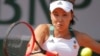 FILE - China's Shuai Peng plays a shot against Romania's Sorana Cirstea during their first round match of the French Open tennis tournament at the Roland Garros stadium, in Paris, France, May 30, 2017.