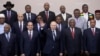 FILE - Russia's President Vladimir Putin waves during a photo with heads of countries taking part in the 2019 Russia-Africa Summit at the Sirius Park of Science and Art in Sochi, Russia, Oct. 24, 2019. 