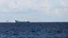 FILE - Chinese vessels are pictured in disputed South China Sea, April 21, 2017.
