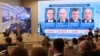 Hasil pemungutan suara awal pemilihan presiden Rusia ditampilkan di layar Komisi Pemilihan Umum Pusat di Moskow, Minggu 17 Maret 2024 di mana Putin unggul jauh dengan lebih dari 87 persen.